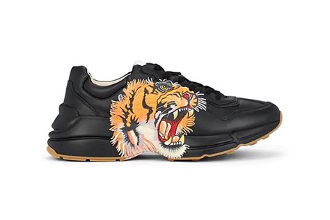 gucci tiger print trainers|GUCCI Rhyton logo.